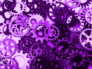 Lots of small purple cogs, illustrating search engine optimisation.