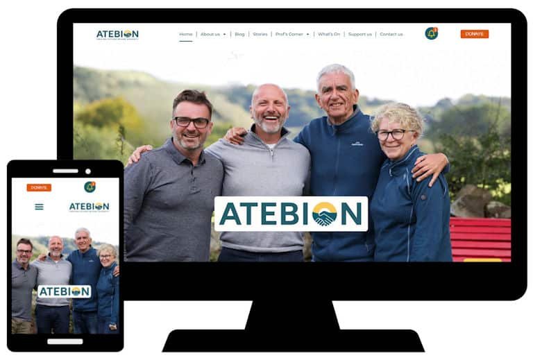 Mock up of home page of Atebion website on pc screen and mobile phone.